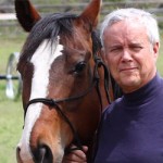 Picture of Tom Martin, Founder and Owner with one of his horses